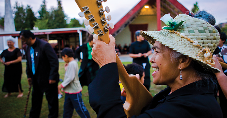 Group singing waiata on a marae