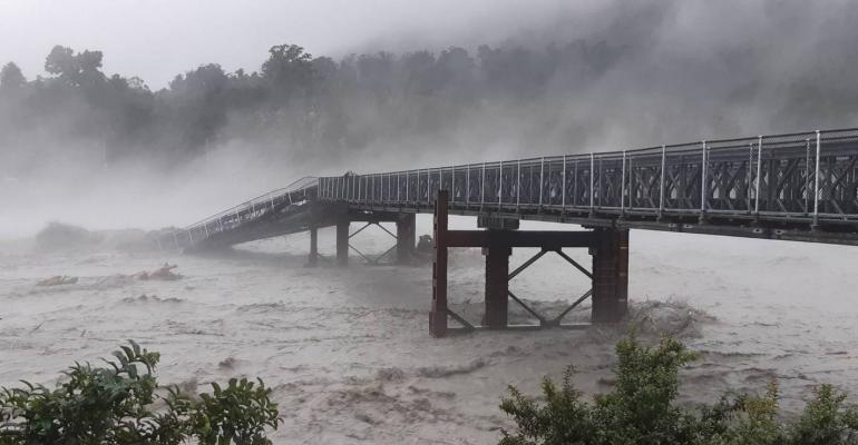 Flooding and rain at a bridge
